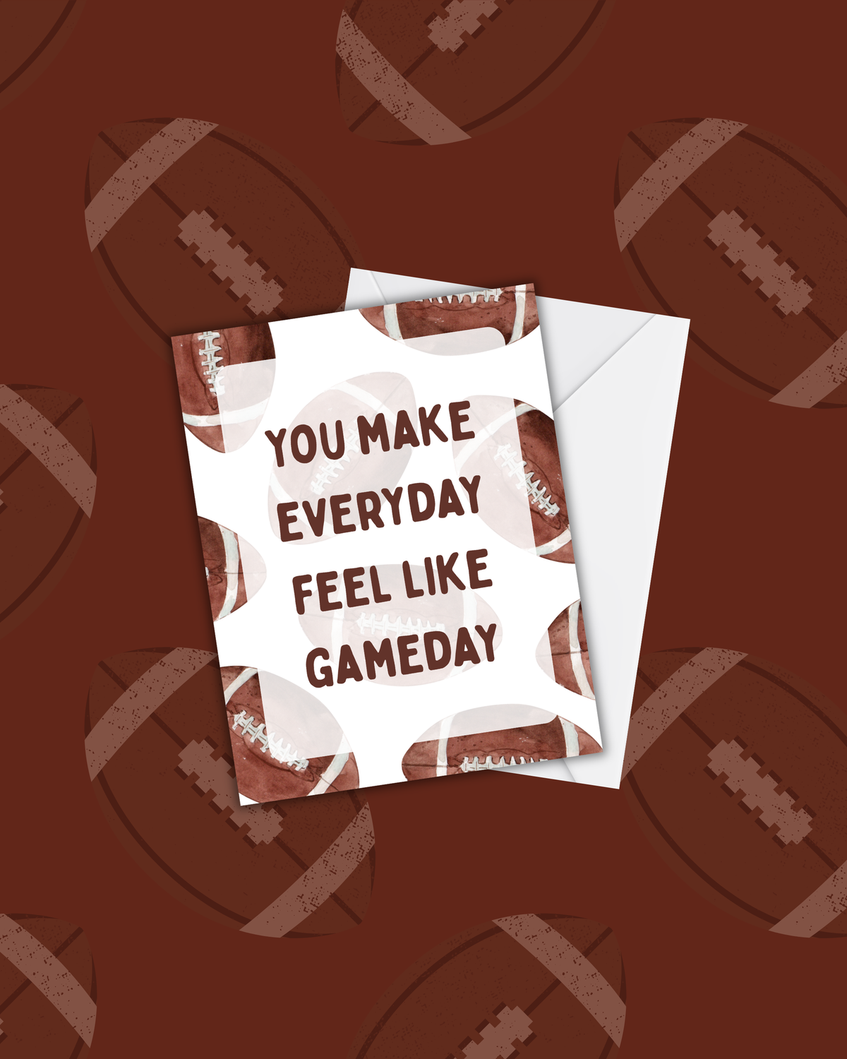 A greeting card with a football pattern and the text 'YOU MAKE EVERYDAY FEEL LIKE GAMEDAY' in brown lettering, shown with a white envelope on a dark brown football-patterned background.