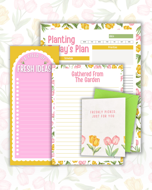 Floral-themed stationery set with notepads and a card on a floral background