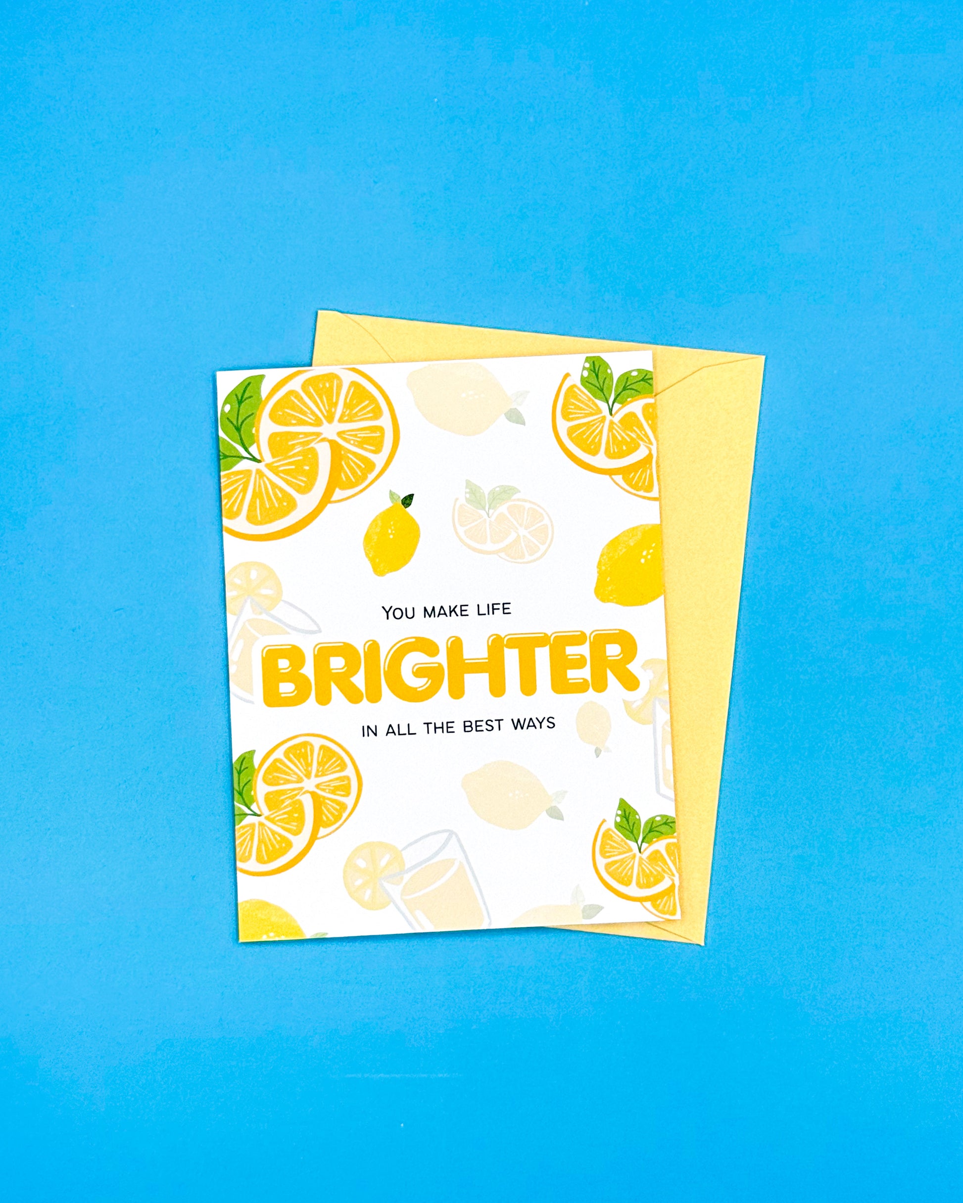 Greeting card with lemon illustrations and text on a blue background