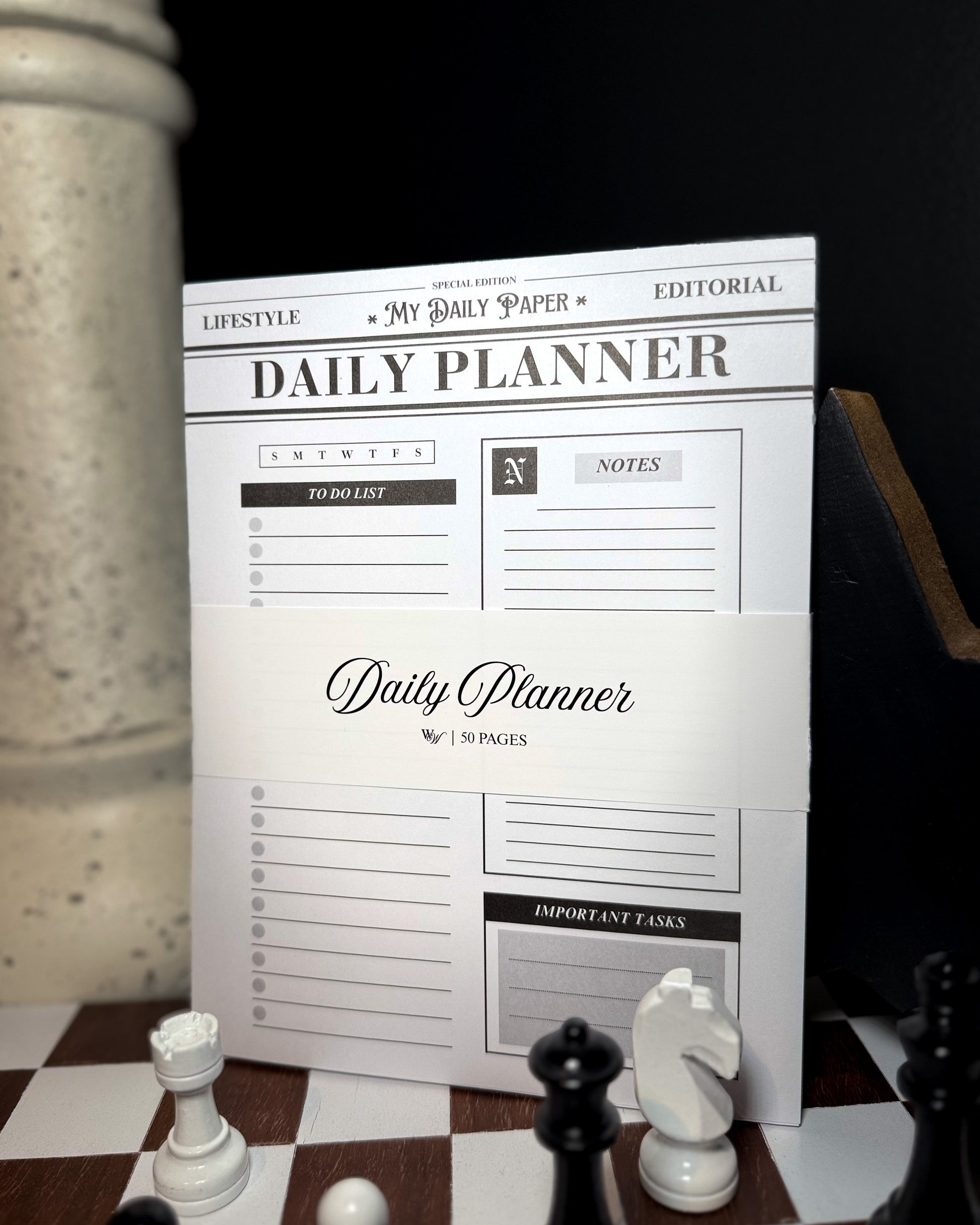 Daily planner on a chessboard with chess pieces